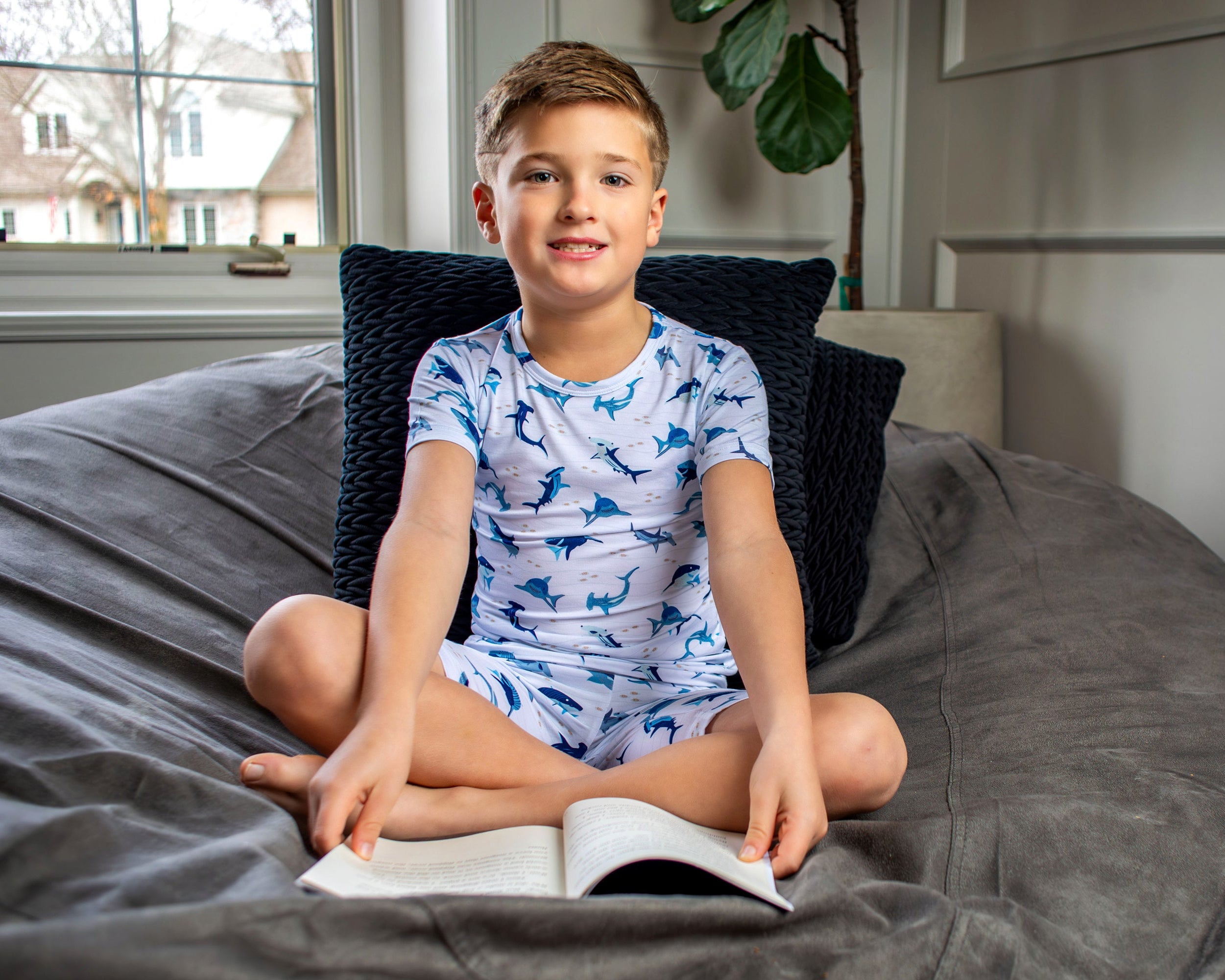 Hammerhead and great white shark print pajamas for kids, made from organic bamboo and designed for the coziest night of sleep.